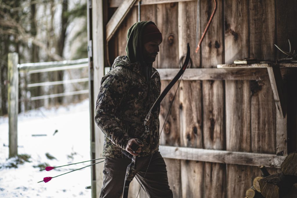 traditional archer, trad archer, archer in barn