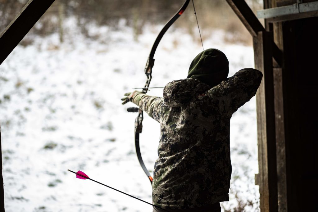 traditional archer, trad archer, archer in barn, archer shooting